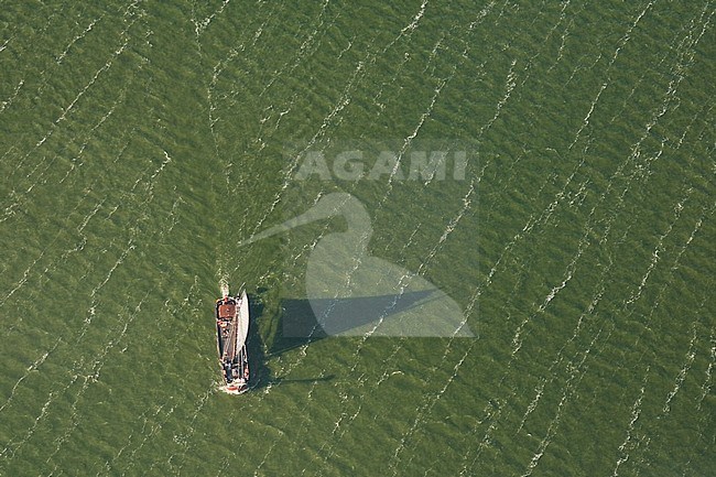 Luchtfoto van zeilboot op zee; Aerial photo of sailing boat at sea stock-image by Agami/Marc Guyt,