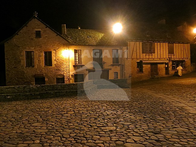 Historic town center of Conques at night, along the Via Podiensis, also know as Le Puy Route, in southern France. Next to Abbey-Church of Saint-Foy. stock-image by Agami/Marc Guyt,